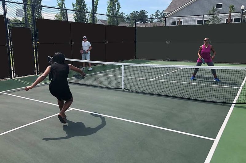Windscreen on a pickleball court fence