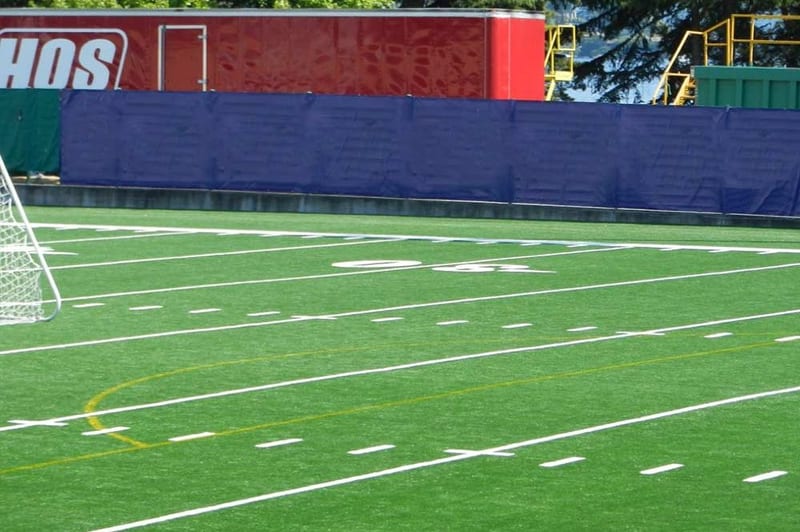 Perimeter screen along a soccer field fence